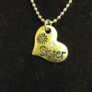 Silver tone Sister necklace on 18 inch chain